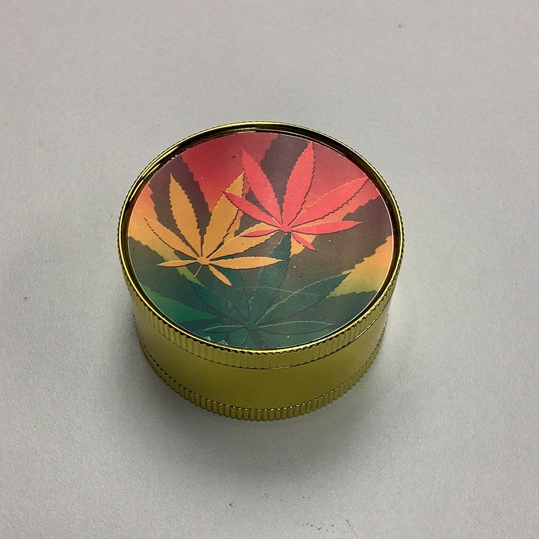 Canna Leaf & Rasta Colors Small 2 Part Metal Grinder 2 Inch yoga smokes yoga studio, delivery, delivery near me, yoga smokes smoke shop, find smoke shop, head shop near me, yoga studio, headshop, head shop, local smoke shop, psl, psl smoke shop, smoke shop, smokeshop, yoga, yoga studio, dispensary, local dispensary, smokeshop near me, port saint lucie, florida, port st lucie, lounge, life, highlife, love, stoned, highsociety. Yoga Smokes Gold