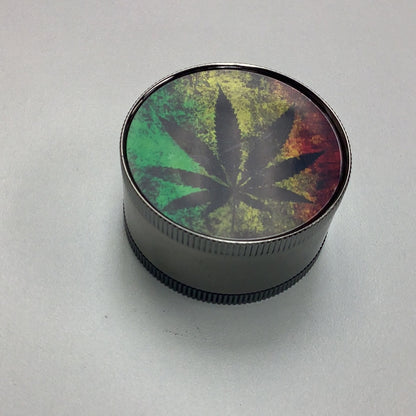 Canna Leaf & Rasta Colors Small 2 Part Metal Grinder 2 Inch yoga smokes yoga studio, delivery, delivery near me, yoga smokes smoke shop, find smoke shop, head shop near me, yoga studio, headshop, head shop, local smoke shop, psl, psl smoke shop, smoke shop, smokeshop, yoga, yoga studio, dispensary, local dispensary, smokeshop near me, port saint lucie, florida, port st lucie, lounge, life, highlife, love, stoned, highsociety. Yoga Smokes Black