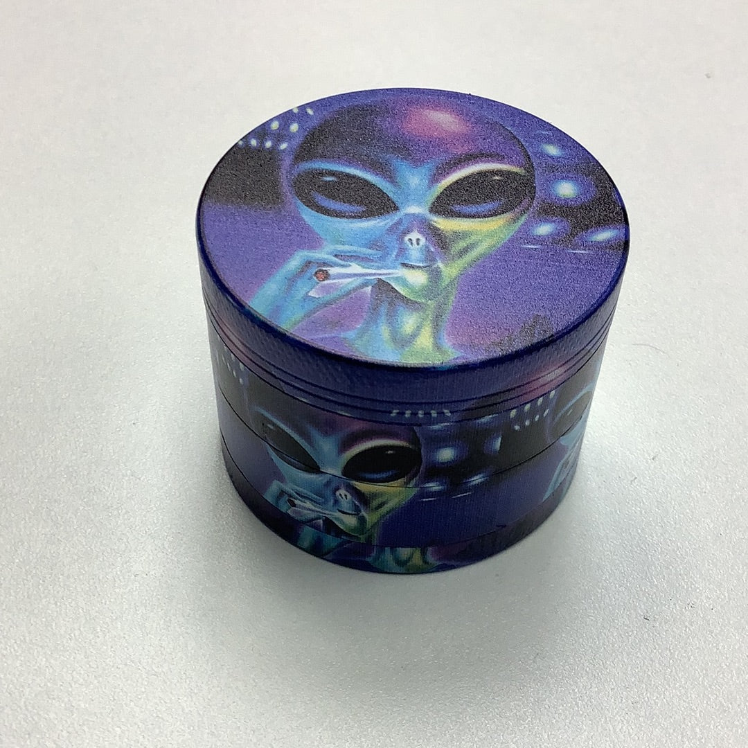Blue Cosmic Alien Metal Grinder 2 Inch yoga smokes yoga studio, delivery, delivery near me, yoga smokes smoke shop, find smoke shop, head shop near me, yoga studio, headshop, head shop, local smoke shop, psl, psl smoke shop, smoke shop, smokeshop, yoga, yoga studio, dispensary, local dispensary, smokeshop near me, port saint lucie, florida, port st lucie, lounge, life, highlife, love, stoned, highsociety. Yoga Smokes